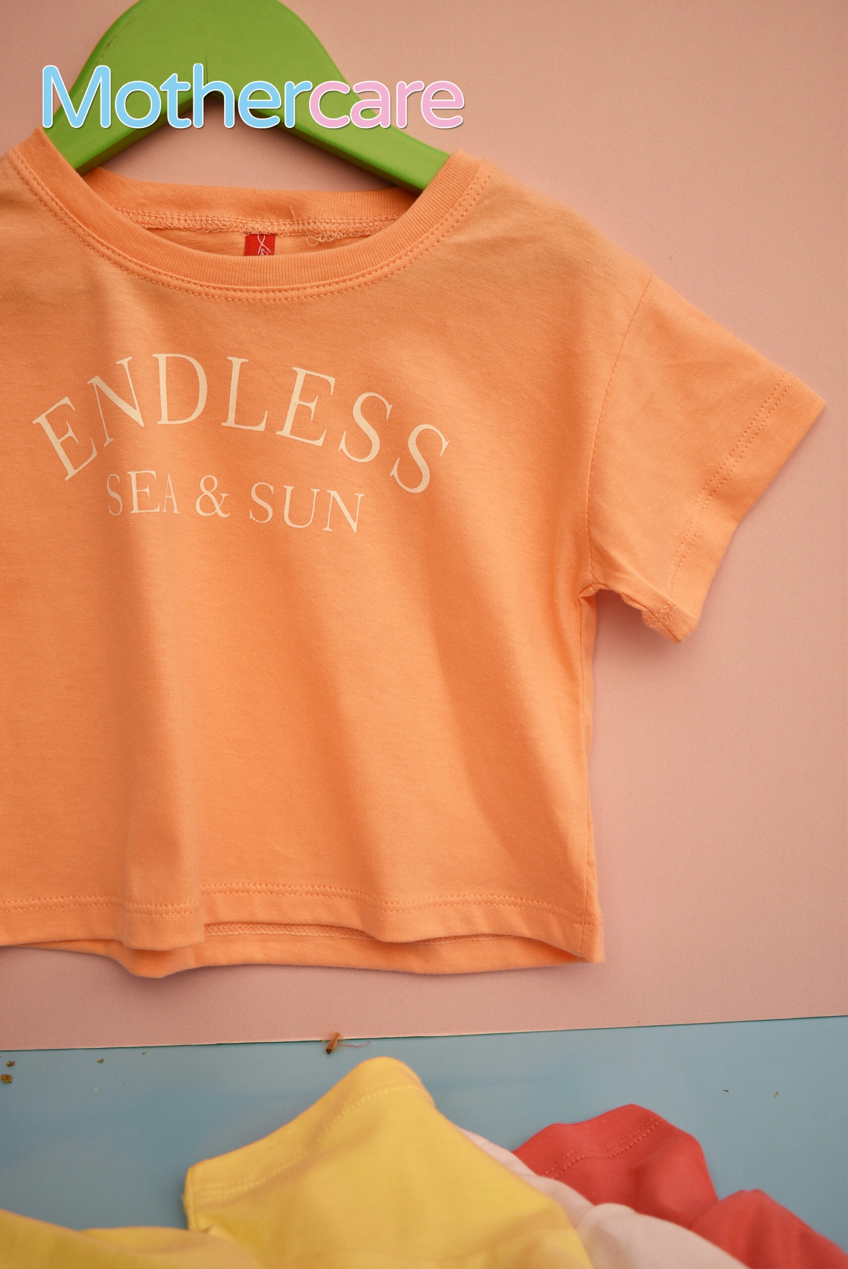 camisetas de bebé de naranja lisa